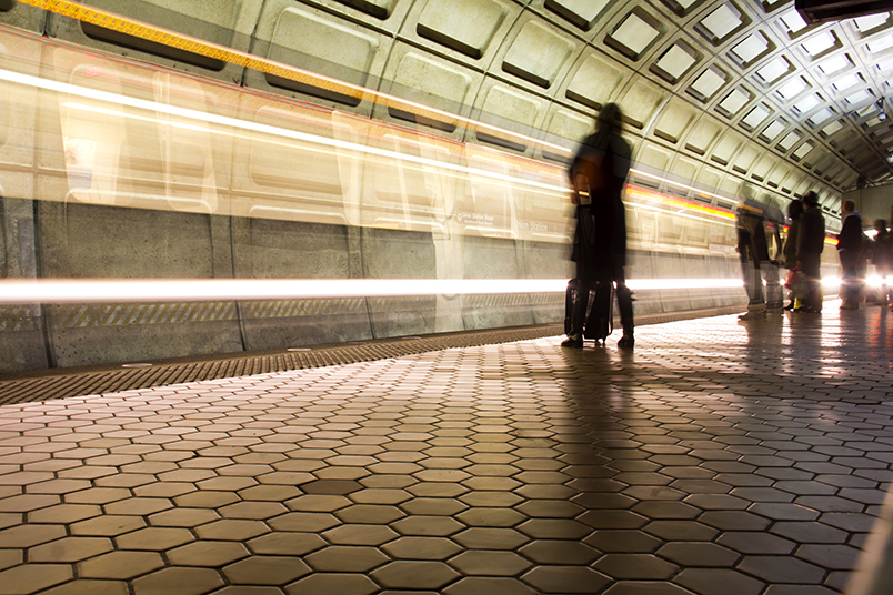 People Standing in Metro Station, Waiting for Train to Arrive