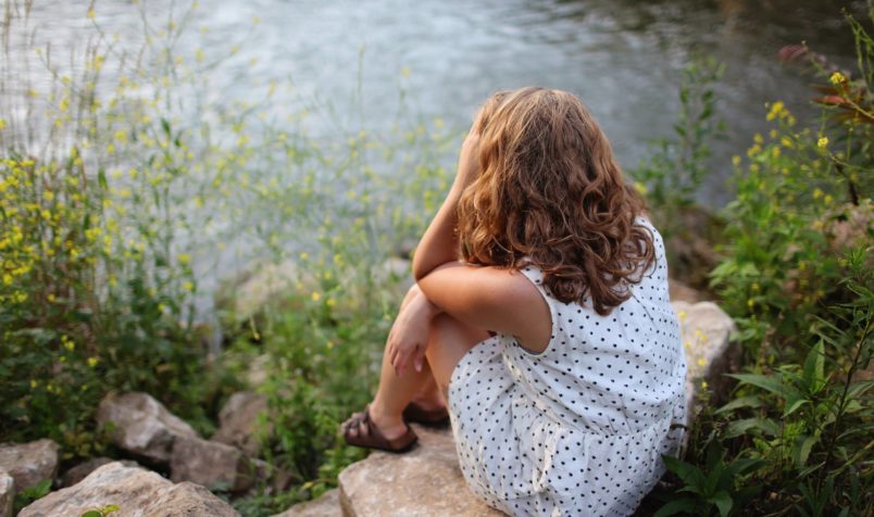 Sad Girl, Sitting on Rock, Pondering, Near River