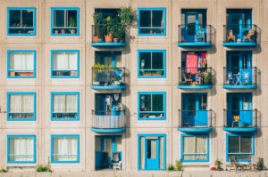 City Building, Blue Balcony, Items on Balconies, Trees