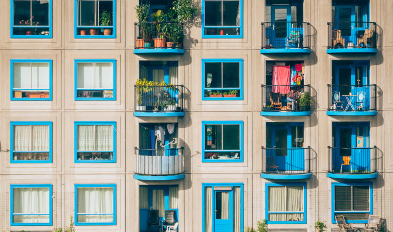 City Building, Blue Balcony, Items on Balconies, Trees