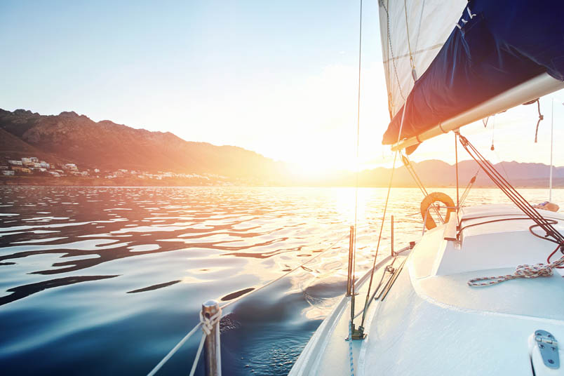 Boat on the ocean at sunset