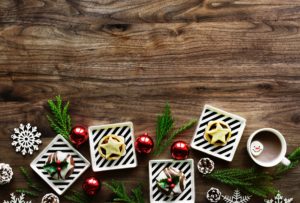 Wooden board with holiday ornaments