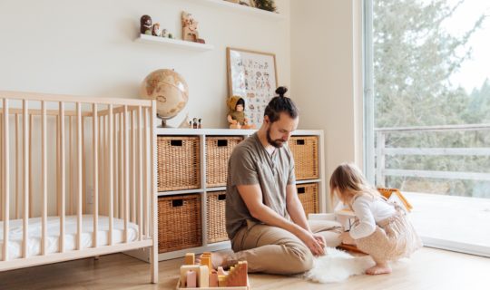 A father helping his daughter