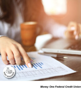 Person pointing, hand, cup, budgeting page, laptop